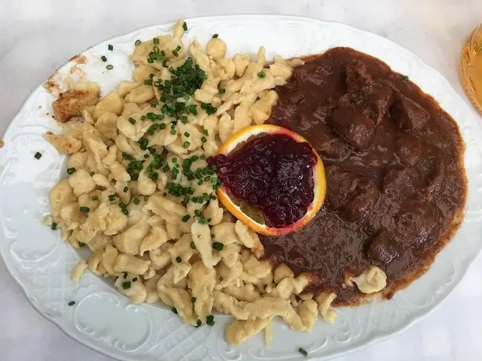 Veal Stew with Spätzle and cranberry sauce