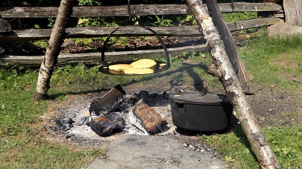 Baking Bread Over A Fire