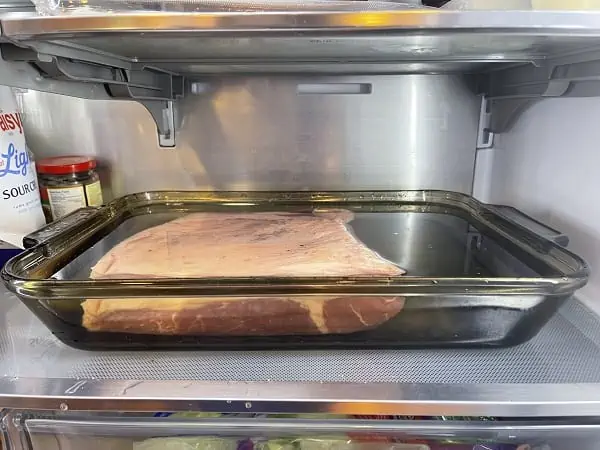 Corned Beef Brisket Soaking in Water in the  refrigerator