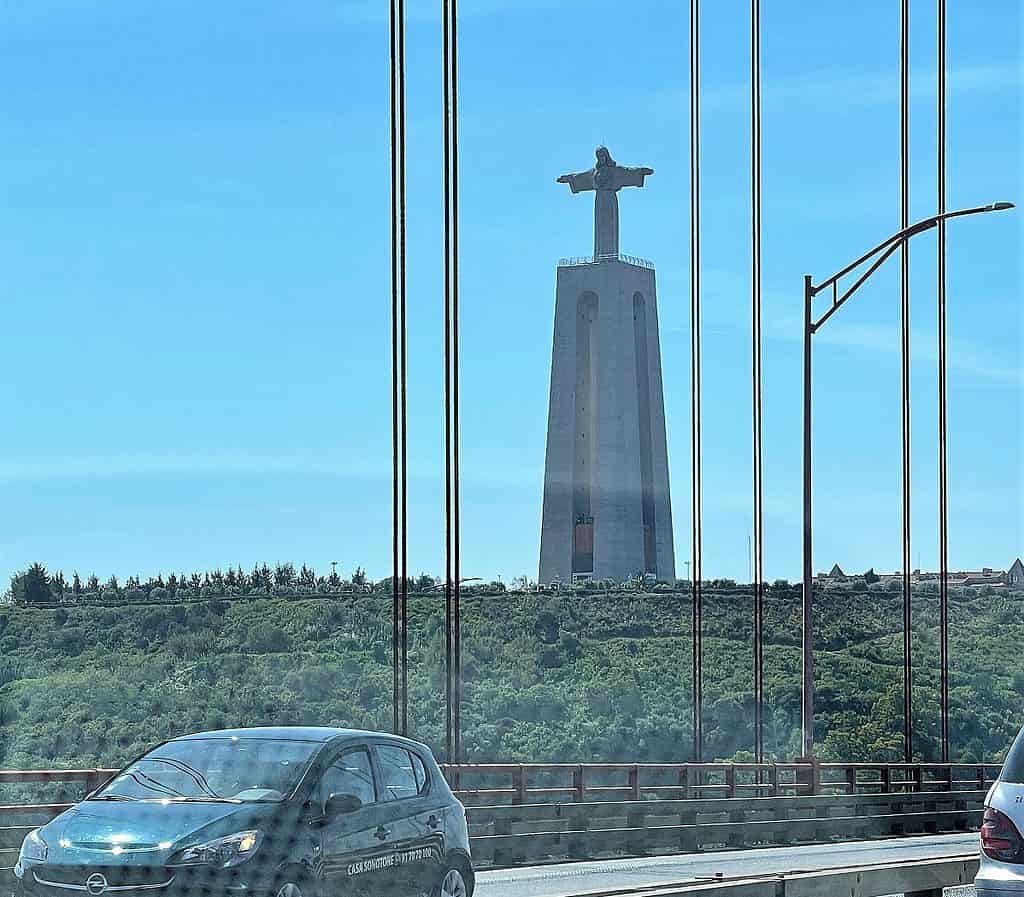 Photo of Lisbon's Christ the Redeemer From The Ponte 25th de Abril