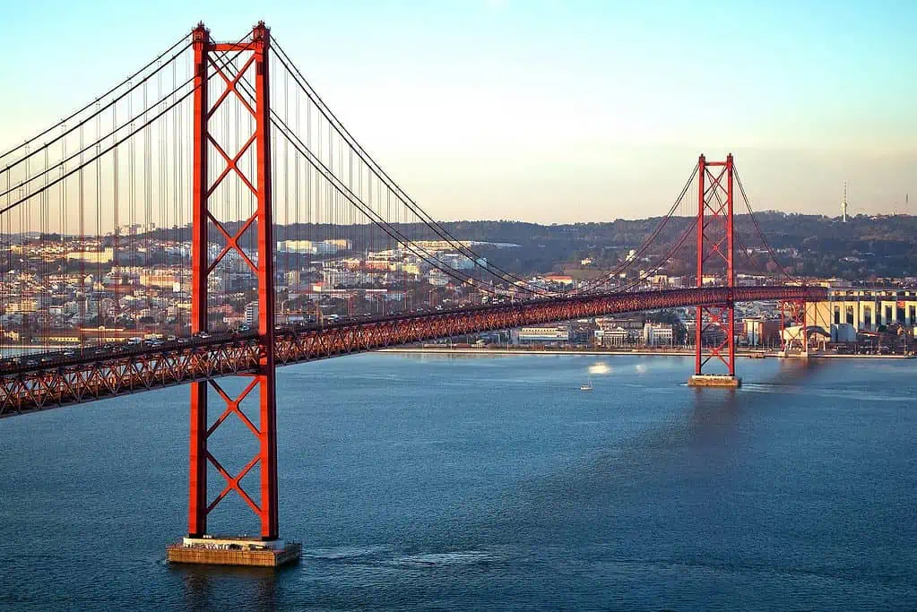 Perfect Portugal Itinerary - A Photo of Ponte 25 de Abril in Lisbon