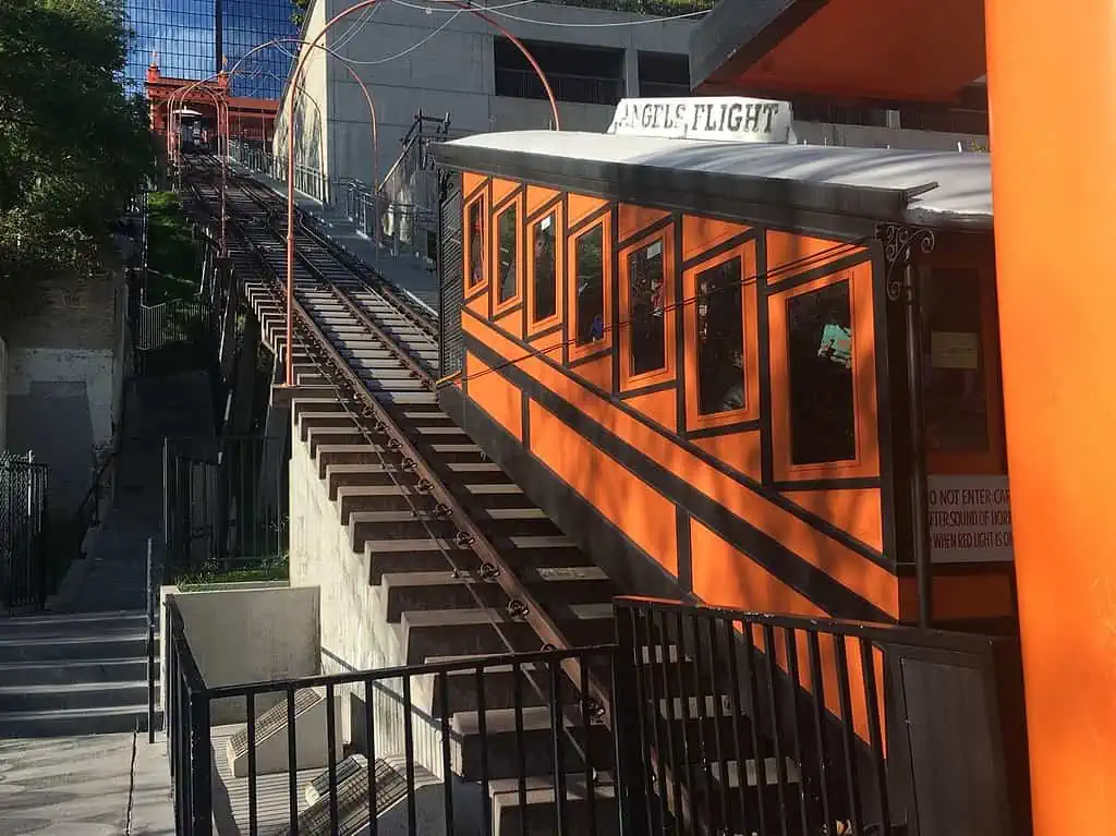 An Orange Angels Flight Funicular Car Climbing the hill.