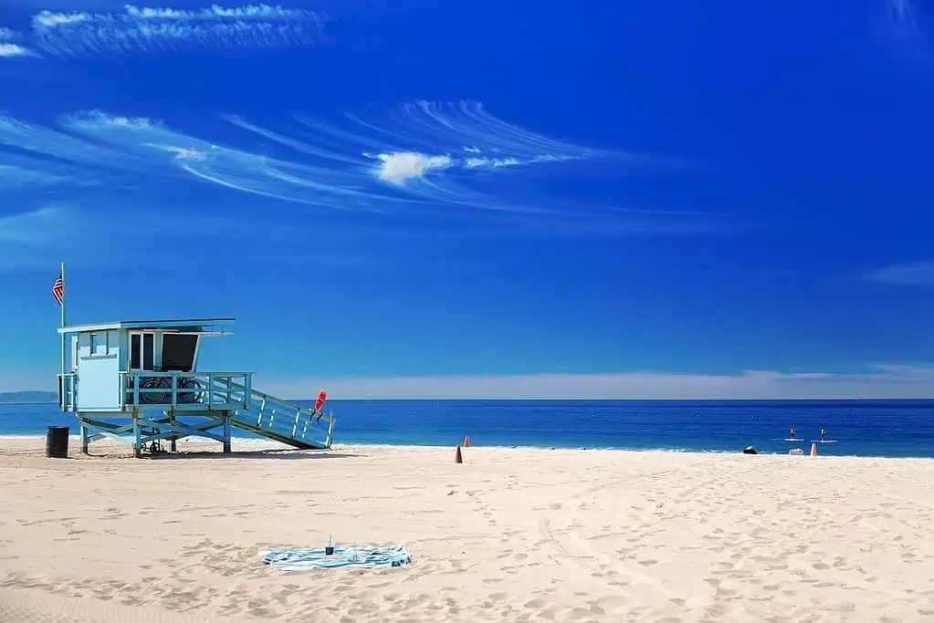 Lifeguard station with American flag on Hermosa beach, California, USA