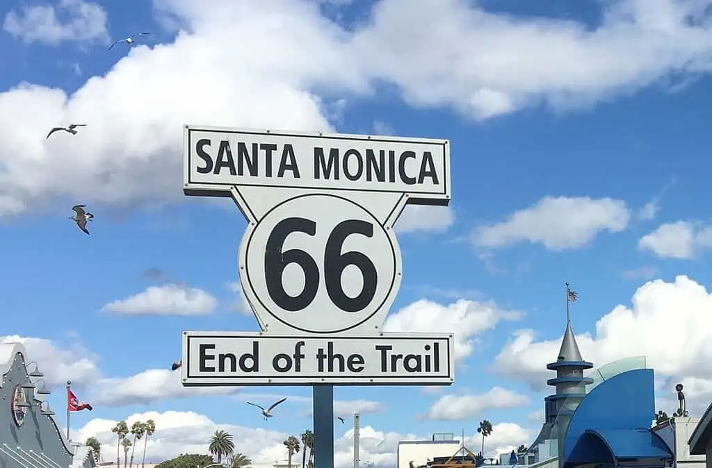 The Historic Road Marker For Route 66 showing Santa Monica - End of the Trail.