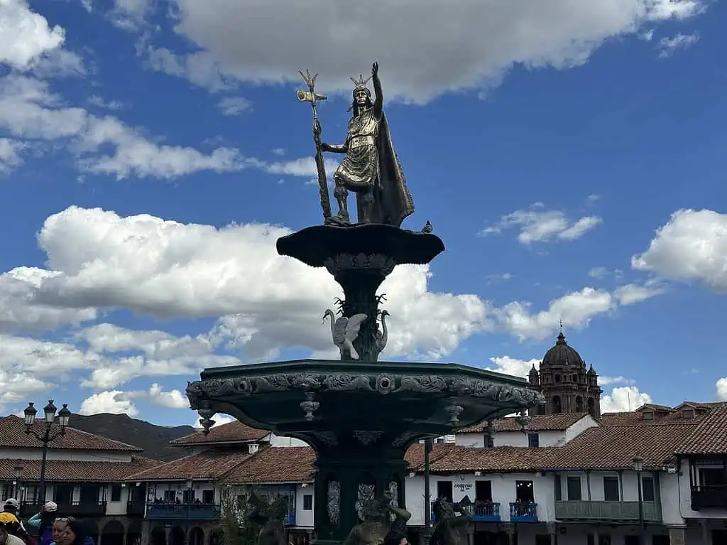 A Statue of Pachacuti on top of the Fountain in Plaza de Armas, Cusco