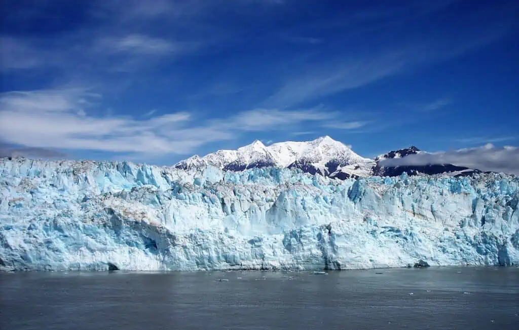 The stunning blue ice at Hubbard Glacier A Stop during the best time to cruise Alaska -