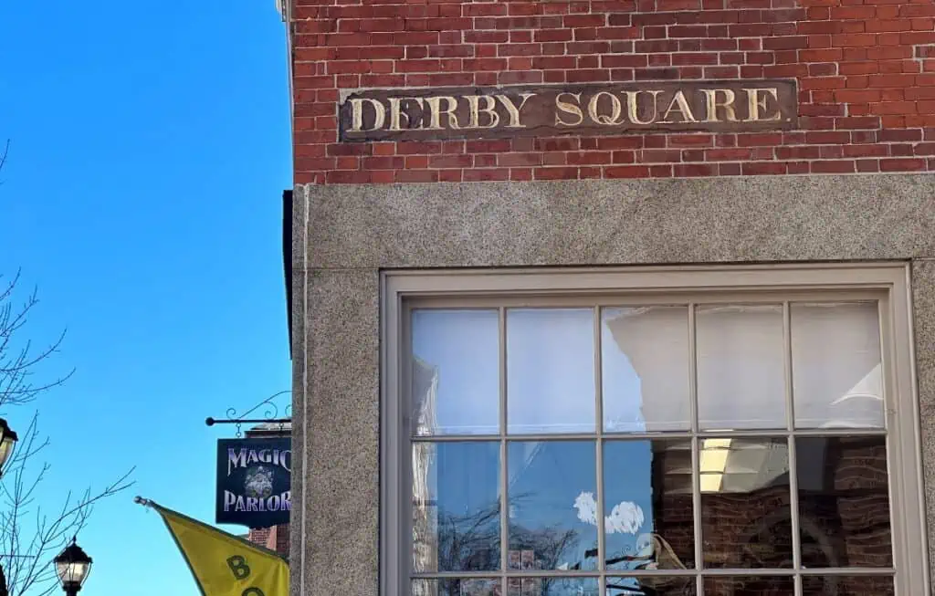 Entrance Sign To Derby Square on An Old Building