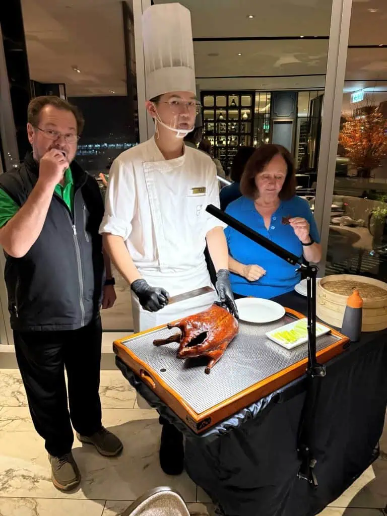 6 Day Taipei & Northern Taiwan Itinerary: Sun Moon Lake, Shifen & Taipei 101 39 The chef invites us to sample the peking duck