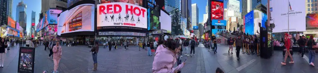 New York City Before A Cruise: Sailing From the Red Hook Cruise Terminal 9 A Panoramic Shot of Times Square In New York City