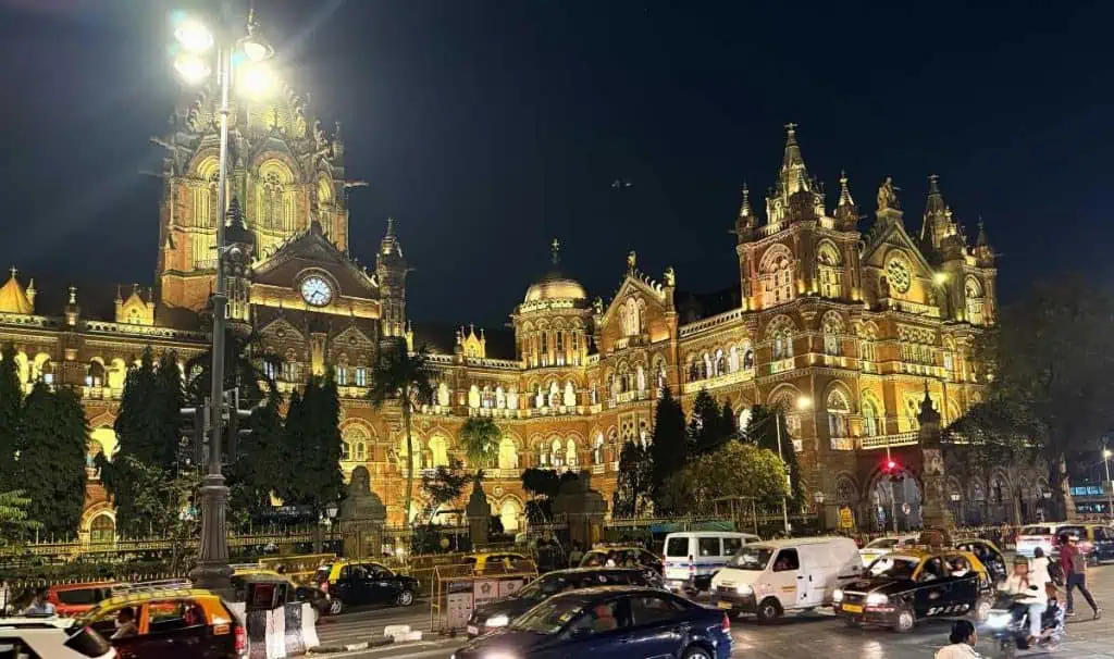 2 Days in Mumbai Before a Cruise: Markets, Street Life, Food, and Local Culture 13 The brightly lit exterior of Chhatrapati Shivaji Maharaj Terminus a Victorian Gothic and Indian designed Train station in Mumbai) After Dark