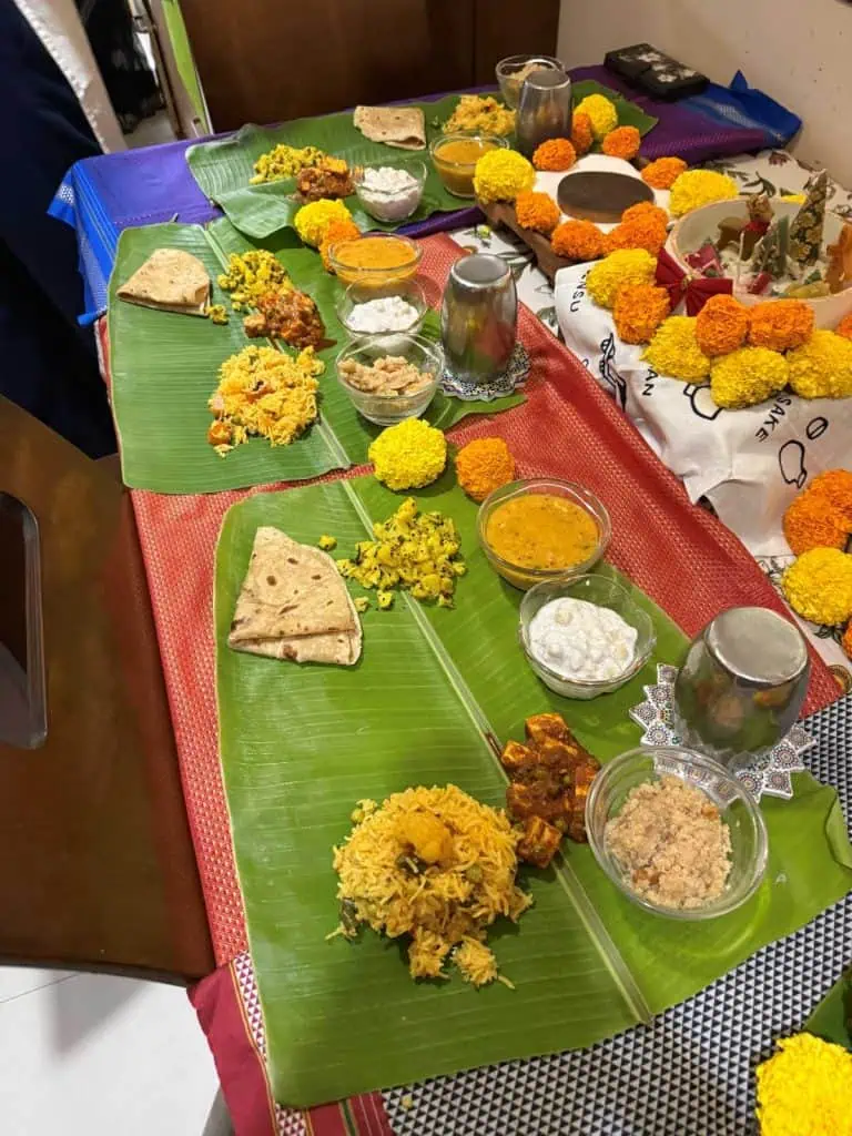 2 Days in Mumbai Before a Cruise: Markets, Street Life, Food, and Local Culture 28 The beautiful table setting with all the side dishes placed on individual banana leaves